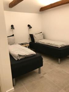 Postel nebo postele na pokoji v ubytování Gl.Hastrup Guesthouse