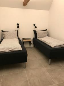 Postel nebo postele na pokoji v ubytování Gl.Hastrup Guesthouse
