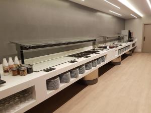 Kuchyň nebo kuchyňský kout v ubytování Hotel Perla
