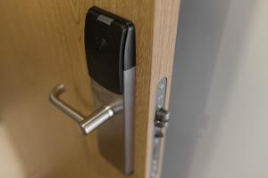a close up of a door with a handle at Hotel Londres Estoril / Cascais in Estoril