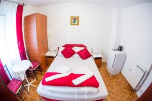 Postel nebo postele na pokoji v ubytování Guest House Vucicevic