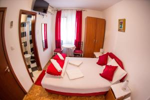 Postel nebo postele na pokoji v ubytování Guest House Vucicevic