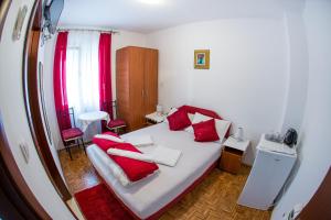 Postel nebo postele na pokoji v ubytování Guest House Vucicevic