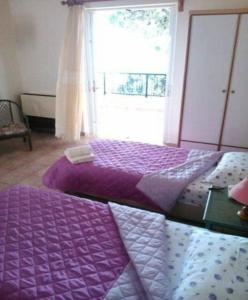 Postel nebo postele na pokoji v ubytování Maviria