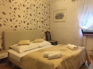 Łóżko lub łóżka w pokoju w obiekcie Villa Almira