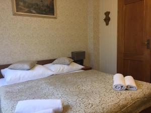 Łóżko lub łóżka w pokoju w obiekcie Villa Almira