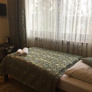 Łóżko lub łóżka w pokoju w obiekcie Villa Almira
