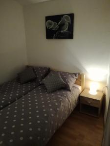 Кровать или кровати в номере Guest House Kvartin