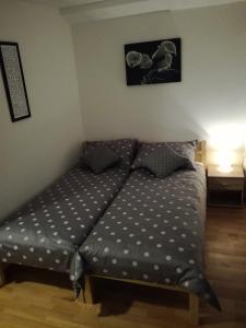 Postel nebo postele na pokoji v ubytování Guest House Kvartin