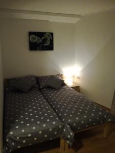 Кровать или кровати в номере Guest House Kvartin