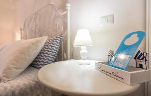 Voodi või voodid majutusasutuse White Charme Rooms toas