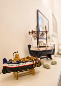 Foto Algheros asuva majutusasutuse White Charme Rooms galeriist