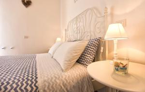 Voodi või voodid majutusasutuse White Charme Rooms toas