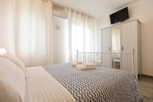 Voodi või voodid majutusasutuse White Charme Rooms toas