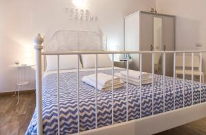 Voodi või voodid majutusasutuse White Charme Rooms toas