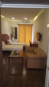 Postel nebo postele na pokoji v ubytování Dreams Suites