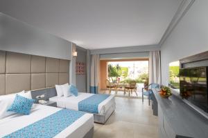 Postel nebo postele na pokoji v ubytování Ali Baba Palace Resort + 143 fotografií