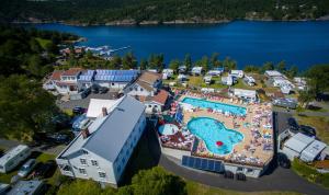 an aerial view of a resort with a swimming pool at Sørlandet Feriesenter in Risør