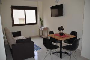 A television and/or entertainment centre at Sol y Playa