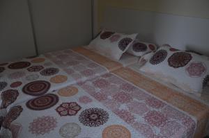 A bed or beds in a room at Sol y Playa