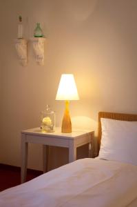 Posteľ alebo postele v izbe v ubytovaní Gasthof Blume