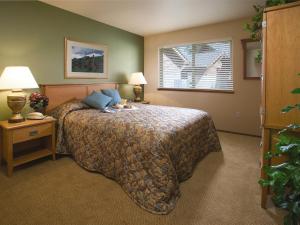 Postel nebo postele na pokoji v ubytování WorldMark Leavenworth