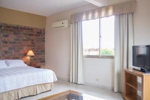 Asuncion Palace tesisinde bir televizyon ve/veya eğlence merkezi