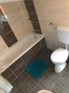 Kúpeľňa v ubytovaní Corner Villa 4