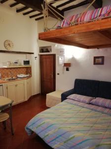 מיטה או מיטות בחדר ב-Appartamento Zafferano