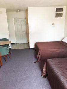 Posezení v ubytování Village Motel