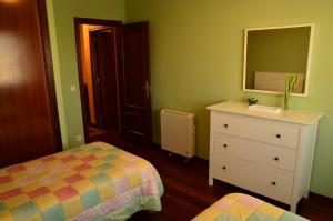 Łóżko lub łóżka w pokoju w obiekcie Apartamento en Beiramar
