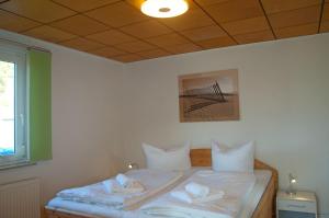 Postel nebo postele na pokoji v ubytování Villa "Emma" in Sellin