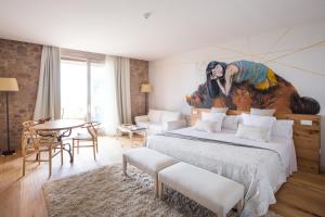 Postel nebo postele na pokoji v ubytování La Garriga de Castelladral