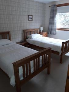 Tempat tidur dalam kamar di The Pally - behind 13 Palace Road, Kirkwall, Orkney - STL OR00122F