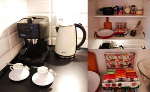 キェルツェにあるOranger Studioのコーヒーメーカー付きキッチンの写真2枚