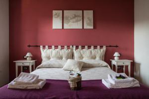 Postel nebo postele na pokoji v ubytování Agriturismo Angiò nel Cerè