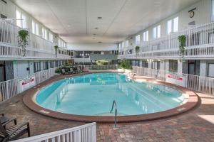 
a large swimming pool in a large room at Club Destin in Destin

