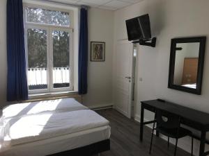 Postel nebo postele na pokoji v ubytování Parkhotel Villa des Effats Vielsalm