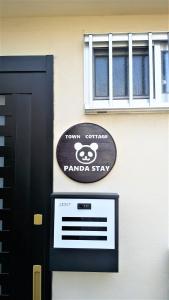 Certifikát, ocenenie alebo iný dokument vystavený v ubytovaní Panda Stay Okayama