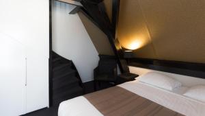 Postel nebo postele na pokoji v ubytování Hotel Zilt