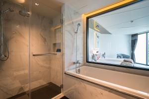 Ein Badezimmer in der Unterkunft Mera Mare Pattaya