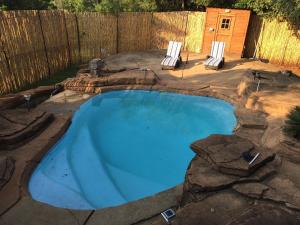 Bazén v ubytování ConcordiaVOC nebo v jeho okolí