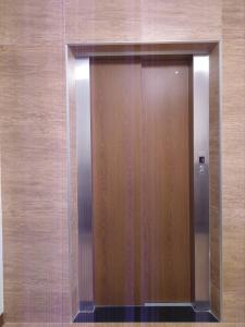 a elevator in a building with its door open at Dolphin Love Homestay in Jian