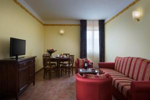 TV a/nebo společenská místnost v ubytování Hotel San Gregorio