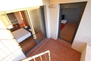 Posteľ alebo postele v izbe v ubytovaní For a Stay Las Dunas