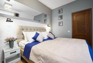 Postel nebo postele na pokoji v ubytování ANTARES Apart hotel