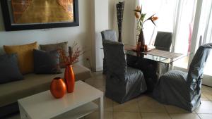 Posedenie v ubytovaní San Giorgio Luxury Apartment Taormina-Panoramic Pool & Parking Space