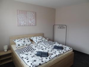 Posteľ alebo postele v izbe v ubytovaní Apartmán Lednická