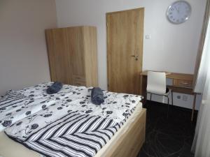Posteľ alebo postele v izbe v ubytovaní Apartmán Lednická + 4 fotografie