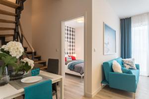 Posteľ alebo postele v izbe v ubytovaní Deluxe Apartments by The Railway Station Wroclaw